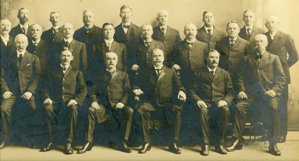 In this 1913 Maine House of Representatives photograph, Edwin F. Yeaton is 2nd from left in the back row.